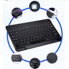 A black multi-device Bluetooth keyboard and mouse combo shown with various components.