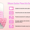 Pinza de silicona rosa para smartphone, diseñada para videollamadas y fotografía manos libres.