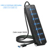 A black USB 3.0 hub with seven ports and a cable, showing its connection to a USB plug.