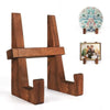 A set of vintage wooden cookbook holders featuring a stand and decorative plate.