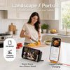 A woman prepares food in a kitchen while a foldable USB-C to USB-C charging adapter and phone stand are displayed.