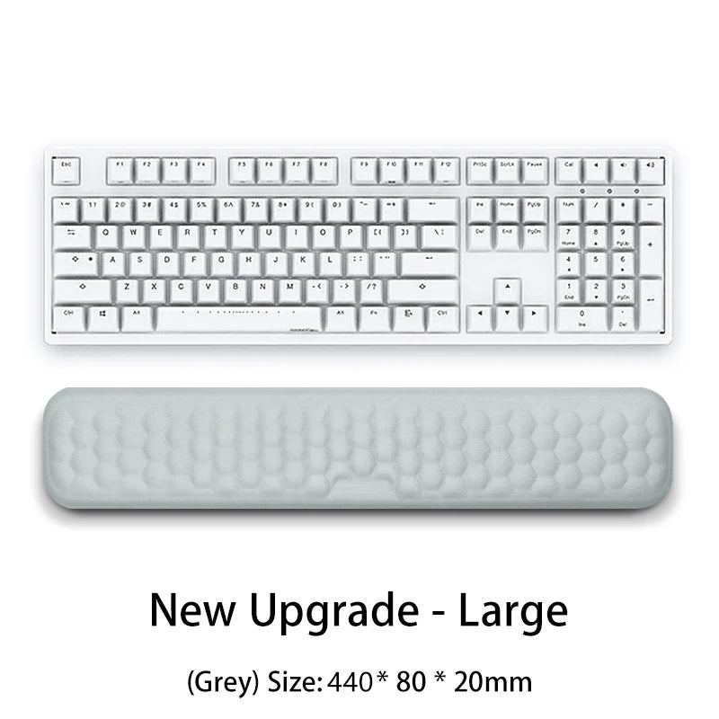 A grey ergonomic keyboard and mouse wrist rest pad with a large size of 440x80x20mm