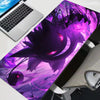 A vibrant purple and black print of a Gengar Pokémon on an XXL gaming mouse pad.