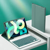 A silver detachable wireless keyboard folio case for an iPad is shown on a white desk.