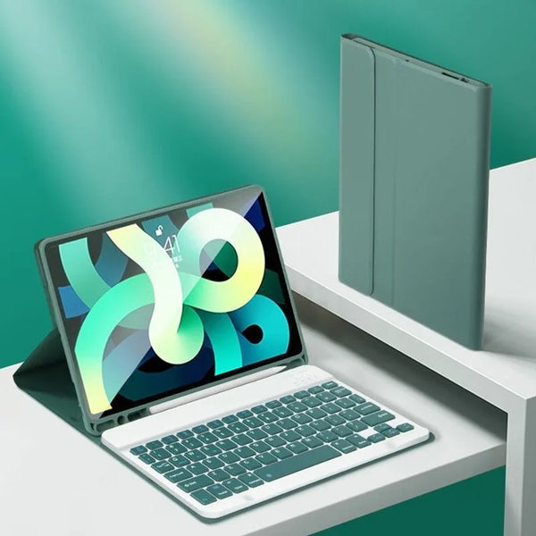 A silver detachable wireless keyboard folio case for an iPad is shown on a white desk.