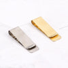 A vintage solid brass money clip with a card holder shown in a horizontal layout.