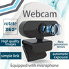 A black webcam is shown with a rotating lens and equipped with a microphone.
