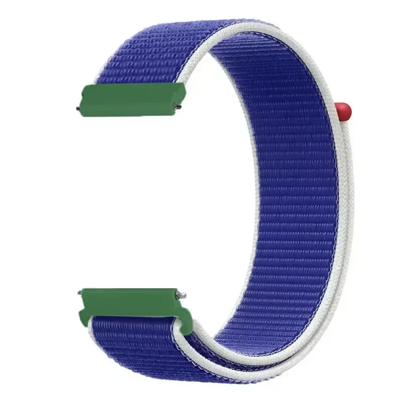 A purple and white nylon loop watch strap is shown, featuring a green buckle.