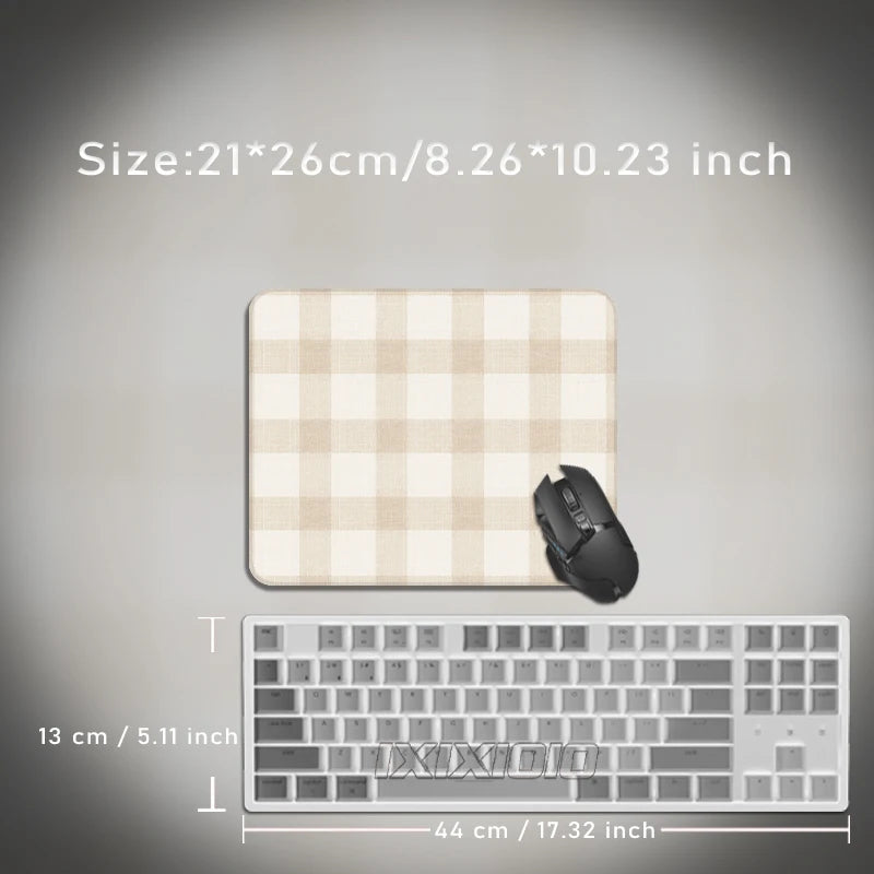 A beige plaid pattern mouse pad is shown next to a white keyboard, with dimensions provided.