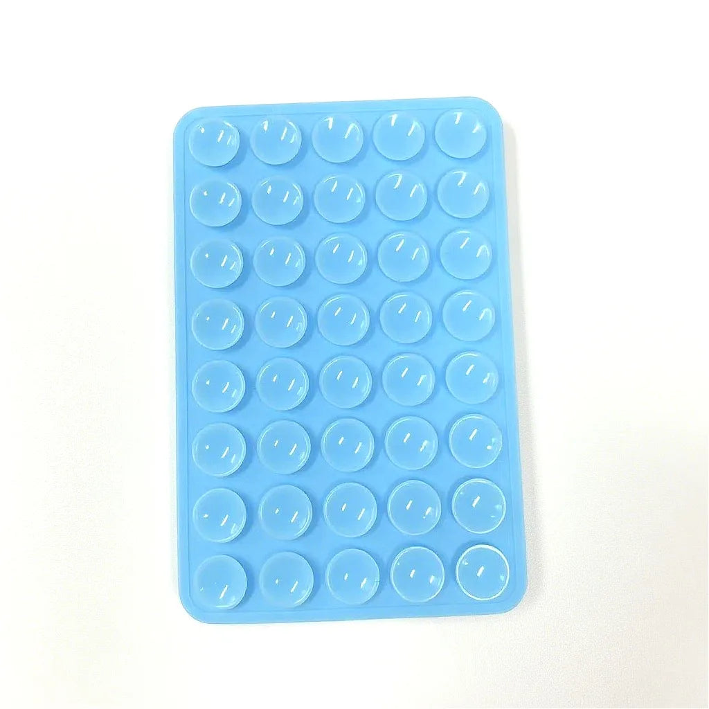 A blue silicone phone mount grip with multiple circular holes for mounting devices.