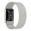 A silver and gray braided nylon watch band for a Whoop 5.0 fitness tracker.