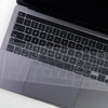 A close-up view of a silver TPU keyboard cover for a MacBook, showing the keys and branding.