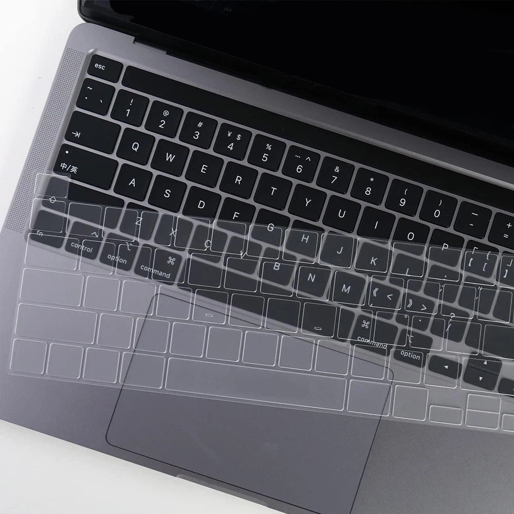 A close-up view of a silver TPU keyboard cover for a MacBook, showing the keys and branding.