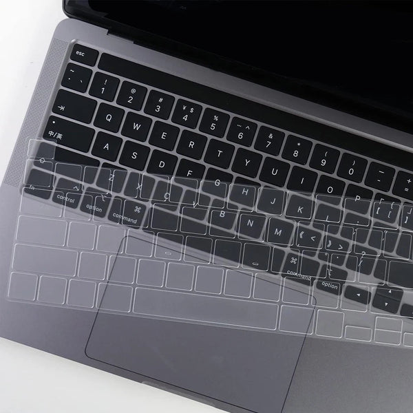 A close-up view of a silver TPU keyboard cover for a MacBook, showing the keys and branding.
