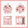 Pink linear mechanical keyboard switches shown in various forms and angles