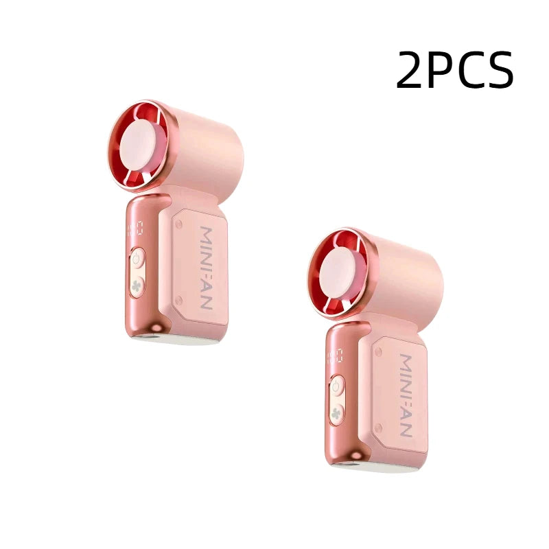 Two pink portable USB rechargeable mini fans shown side by side.