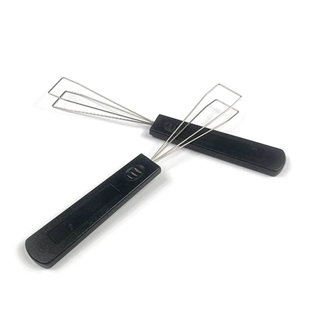 A black mechanical keyboard keycap puller with a metal switch removal tool.