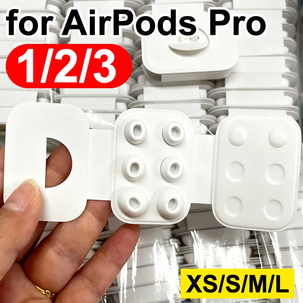 Embouts en silicone blancs de remplacement pour AirPods Pro, insérés dans une coque de chargement.