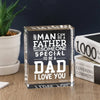 A clear acrylic sign with engraved text that reads I love you and Any man can be a father but it takes someone to be a dad