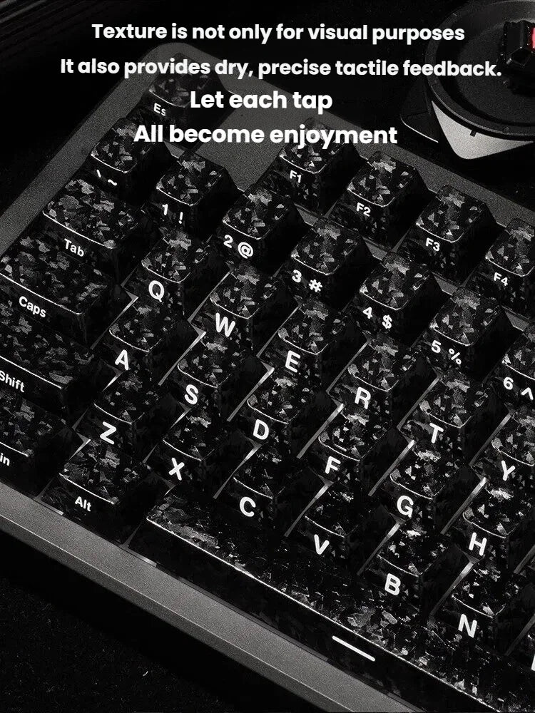 Close-up view of black carbon fiber texture keycaps on an MX mechanical keyboard.
