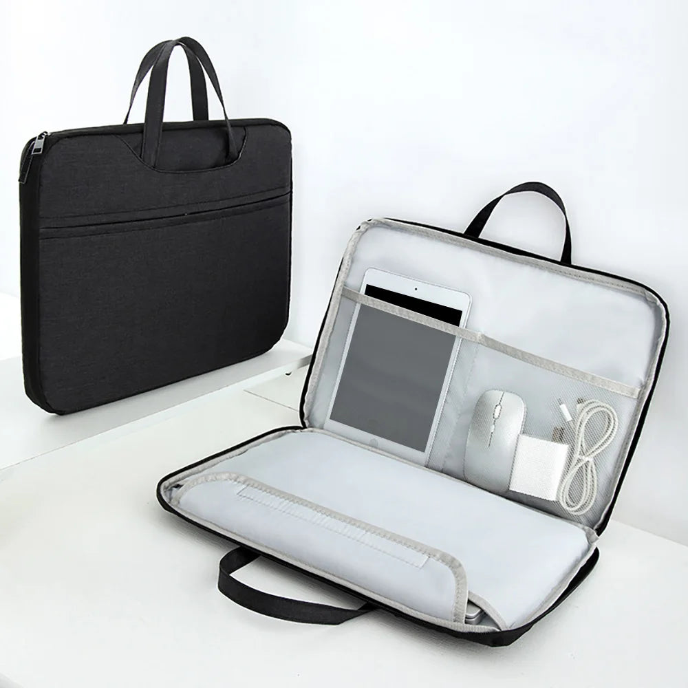 A black universal laptop sleeve for a MacBook or PC, shown open with accessories inside.