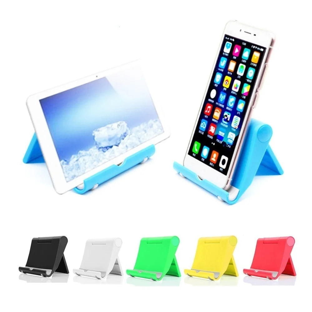 A collection of flexible multi-angle tablet and phone desk stands in various colors including blue, white, green, yellow, and