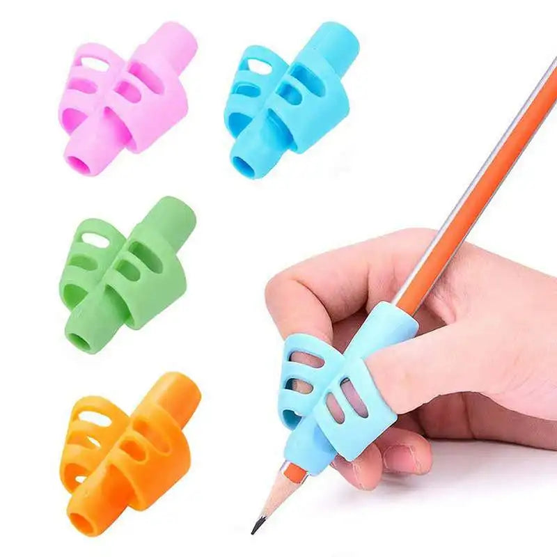 A collection of colorful ergonomic silicone pencil grips in pink, blue, green, and orange held by a hand.