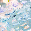 Kawaii cloud pattern masking tape set featuring pastel clouds, rainbows, and stars on a light blue background