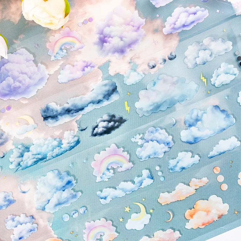 Kawaii cloud pattern masking tape set featuring pastel clouds, rainbows, and stars on a light blue background